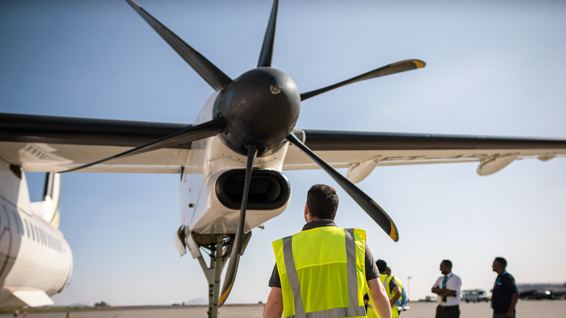 Employee looking at Dowty propeller